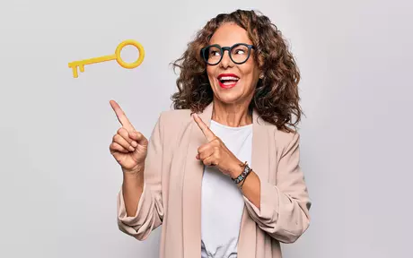 woman pointing to a key