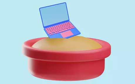 laptop in a sandbox