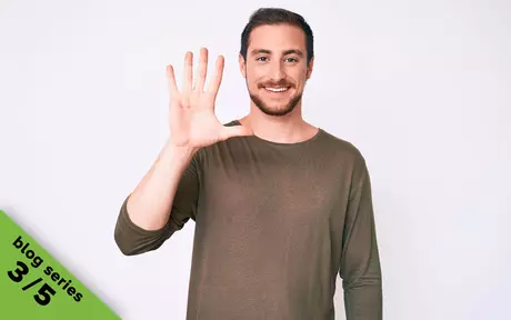 man showing hand with five fingers