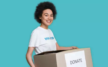 volunteer woman with a box