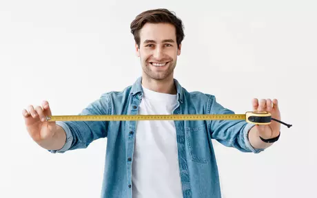 man with tape measure