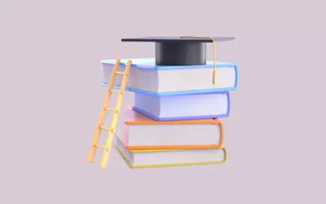 Mortarboard on top of a stack of books