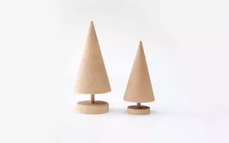 Two wooden trees on a grey background