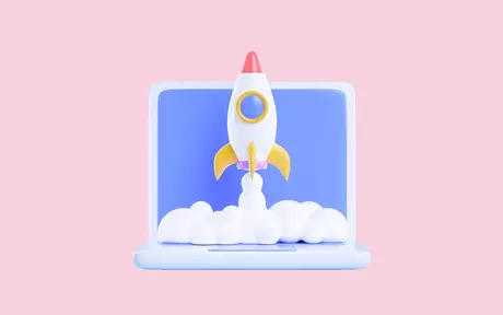 Rocket infront of computer on pink background