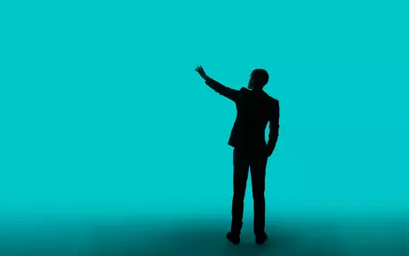 men in suits pointing up small image