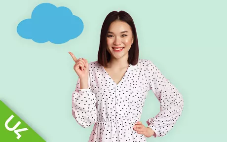 Smiling woman pointing at a cloud